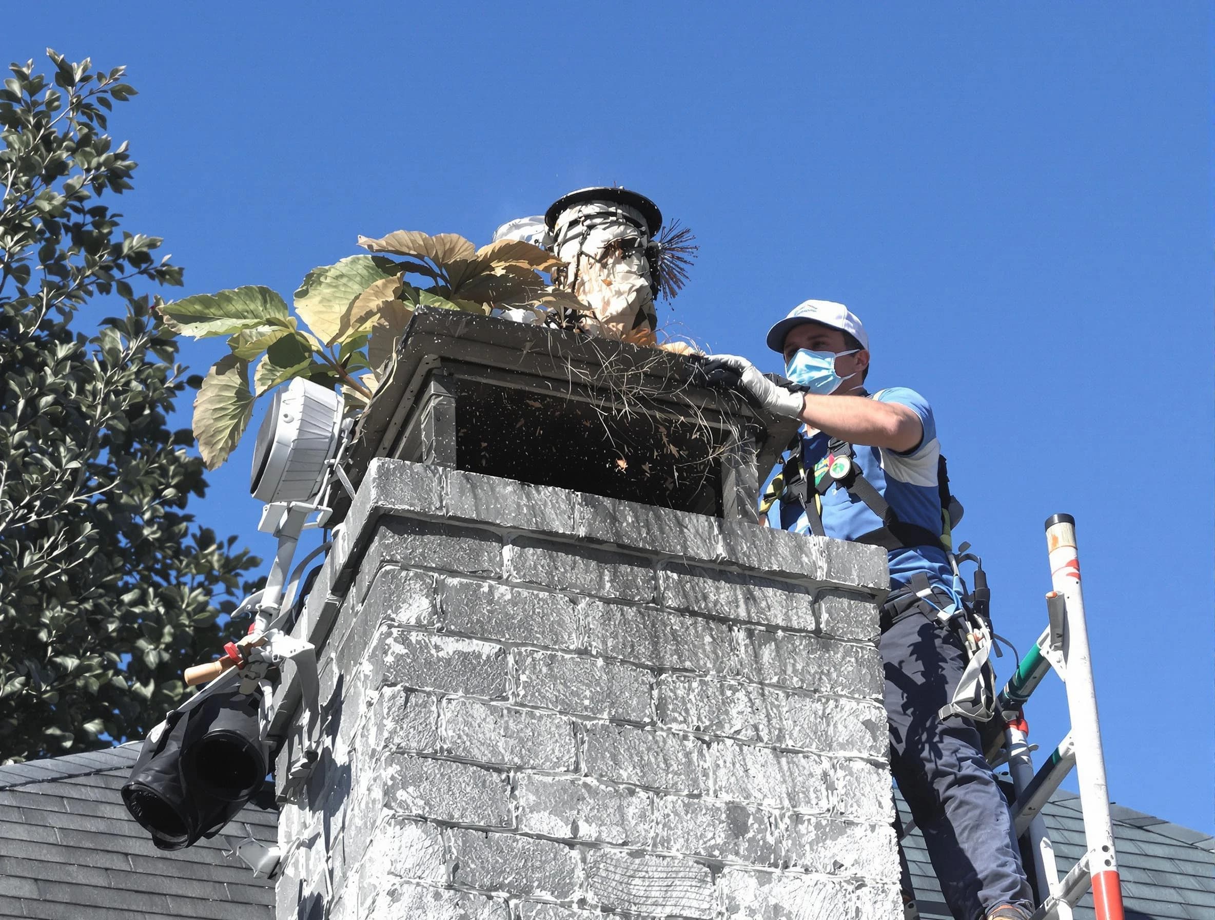 Gilbert Chimney Sweep specialist performing chimney cleaning in Gilbert, AZ