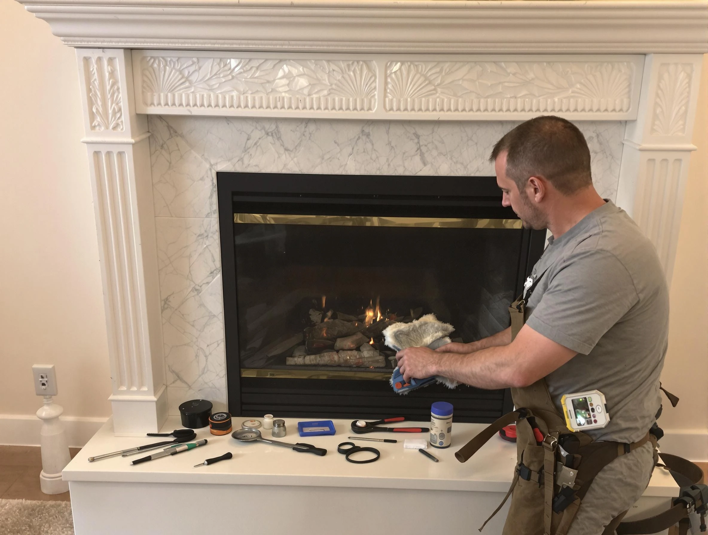 Gilbert Chimney Sweep performing fireplace maintenance in Gilbert, AZ